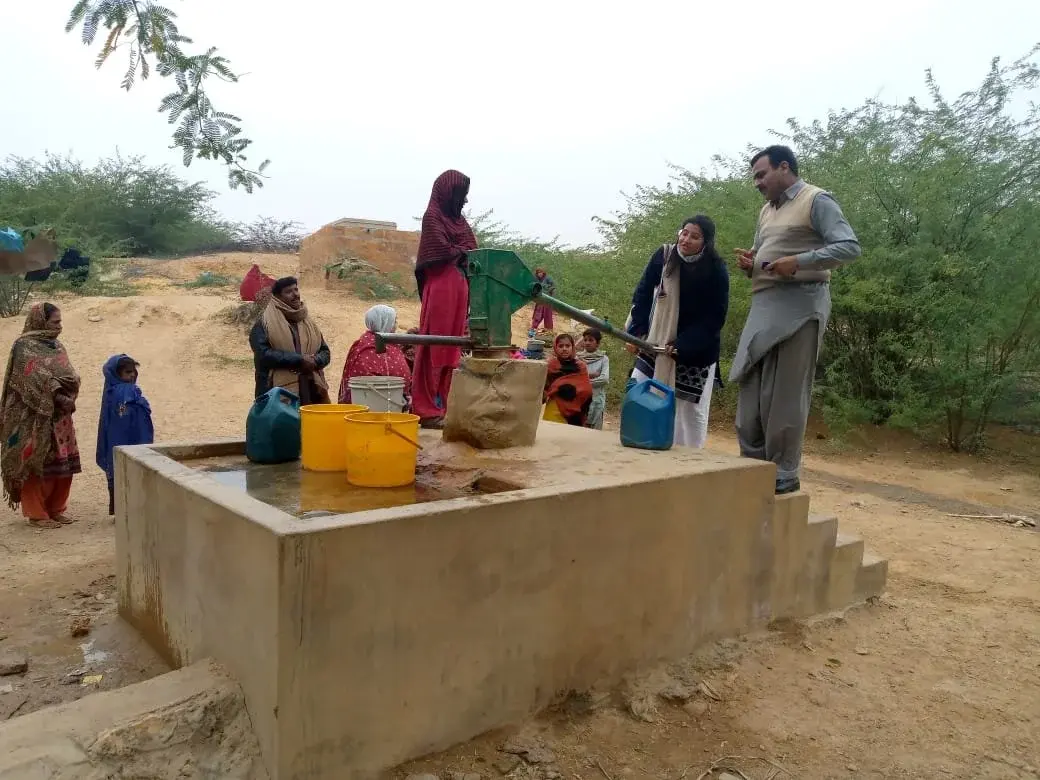 Learning how to use a water pump in rural Sindh