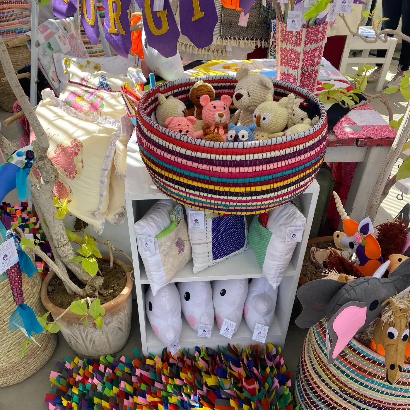 Women artisans' goods for sale at a fundraising event in urban Sindh